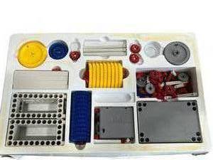 lot 115 image: Vintage Popular Mechanics Power Gears Motorized Building Set and Meccano The Lapins Cretins Playset