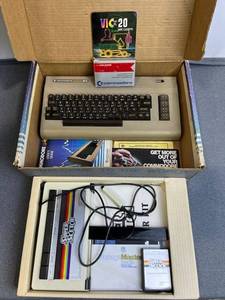 lot 161 image: Vintage Commodore 64 Computer (Powers Up) with Model G2100 Super Sketch, and Car Chase game