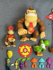 lot 205 image: Jakks Pacific World of Nintendo 6 Donkey Kong Country, 2.5 Diddly Kong, Pikmin Figures, Super Mario Goal Poles, and More
