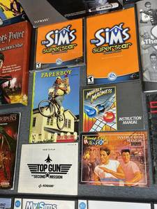 lot 265 image: Used Video Game Lot including Sims, Fly Harry Potters Marauders Map, NES Instruction Manuals, Nintendo DS Cases and Instructions (No Games), and More