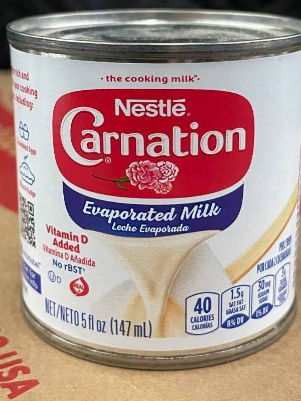 lot 183 image: 24 Pack Nestle Carnation Evaporated Milk 5 fl oz Cans