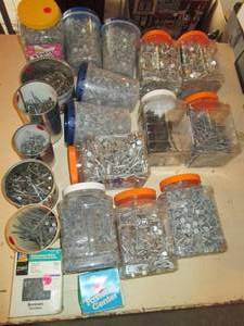 lot 34 image: Multiple Cans and Containers filled...