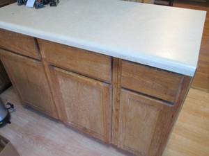 lot 131 image: Wood Kitchen Island with formica co...