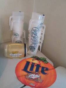 lot 151 image: Stacks of Plastic Miller Lite Servi...