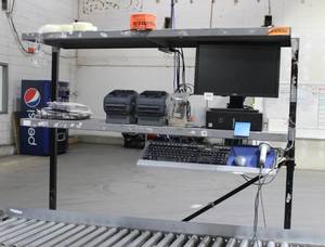 lot 22 image: Steel Shelf Rack That Slips Under The Rollers, Steel 5 Foot L X 6 Foot H X 20 Inch Deep, On Casters