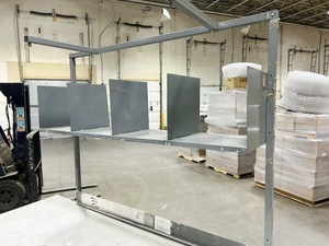lot 36 image: Steel Shelf Rack That Slips Under The Rollers, 5 Foot L X 6 Foot H X 20 Inch Deep, On Casters.