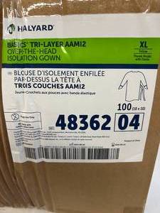 lot 16 image: 1 Case (100 each) NEW Halyard 48362 Single-Use Basics Tri-Layer AAMI2 Over-The-Head Isolation Gown with Thumb Hooks and Elastic - Size XL Yellow - Expiration 426 (dented box)