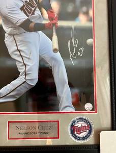 lot 35 image: Nelson Cruz Signed and Framed Photo with MLB COA - 27x23 - Minnesota Twins Baseball