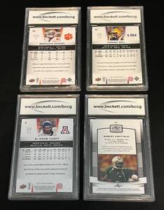 lot 31D image: Lot of 4 BCCG Graded 10 Gem Mint 2014 Star Rookie Rookie Football Cards - Robert Griffin III, Martivis Bryant, Jeremy Hill, and KaDeem Carey