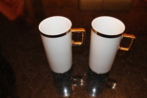 lot 43 image: Elegant Gold-trimmed Tea Cups