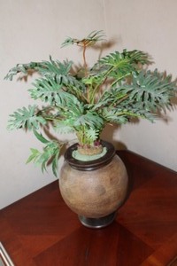 lot 74 image: Terra Cotta Vase with Faux Plant