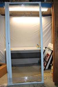 lot 115 image: Anderson Retractable Screen Door