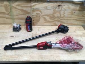 lot 62 image: Toro 60V MAX 13 in.  15 in. Brushless String Trimmer with 2.0Ah Battery And Charger Model # 51831 (Missing Parts)