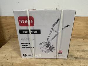 lot 20A image: TORO 10 in. (25.4 cm) 2-Cycle 43cc Cultivator (Retails for $249.99)