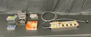 lot 5 image: Monster Power Home Theater Power Center HTS 1000  Memorex 10PK DVD-R  Various Cassett Tapes