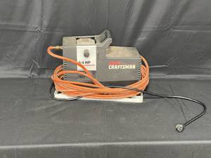 lot 20 image: Sears Craftsman 34 HP Air Compressor