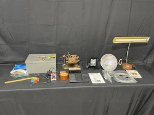 lot 21 image: Fire Resistant Vault Lock Box, Overhead Light, Vintage Desk Lamp, Coasters, Metal Ship Decor and other Office Decor
