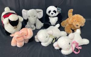 lot 59 image: Lot of Snuggly Stuffed Animals inc Musical Lambs