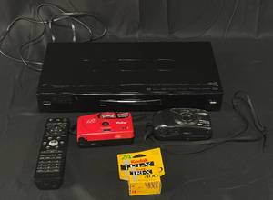 lot 65 image: Vizio DVD Player, Pentax Camera, Vivitar LP45 Camera and Kodak Tri-X 400 Film