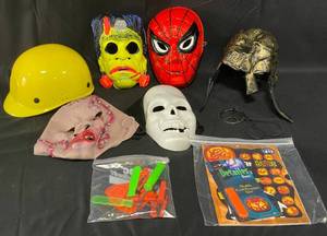 lot 72 image: Lot of Halloween Items inc. Masks and Pumpkin Carving Tools