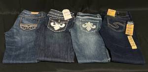 lot 123 image: Lot of Juniors and Womens Jeans - Silver, Red Rivet, Monica and Suki Sz 28, 29, 11, 13