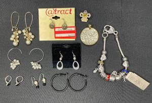 lot 159 image: Lot of Costume Jewelry Earrings, Angel Pin, Bracelet and Pendent