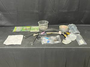 lot 208 image: Lot of Various Hoses, Duct Tape, Faucet Components and More