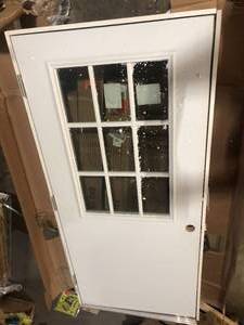 lot 17 image: Left-Hand Inswing 9-Lite Clear Classic External Grilles Primed Fiberglass Smooth Prehung Front Door  Approximately  37 X 80 X 6.5 Customer Returns See Pictures