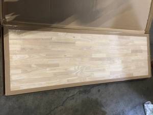 lot 25 image: Hampton Bay 6 ft. L x 25 in. D Unfinished Hevea Solid Wood Butcher Block Countertop With Square Edge  Customer Returns See Pictures