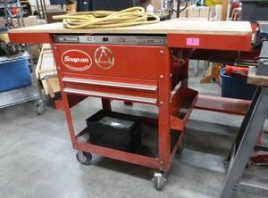 Snap-on tool cabinet 58 inches wide x 20-12 deep wood top, 40 tall, includes misc tools