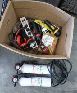 Box of garage items, outlet strip, fire extinguishers, trailer ball, ear covers, flashlights