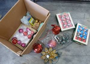 Tote of christmas ornaments and lights