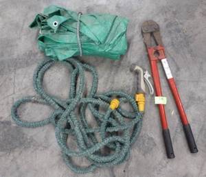 tarp, garden hose and 24 inch bolt cutter
