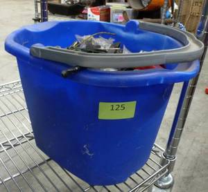 Bucket full of nuts and bolts and various parts