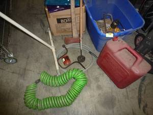 Garage items, axe, hose, magnet, gas can, oil cans etc