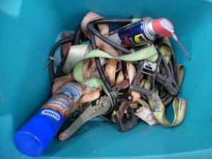 Tiedown straps, jumper cables, sealant