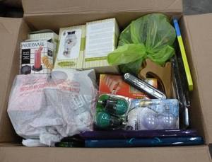 Box full of items either not sold or not picked up