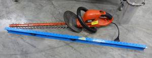 Black and Decker hedge trimmer (works) and 4 ft ruler
