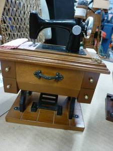 Two sewing machine music boxes - both work