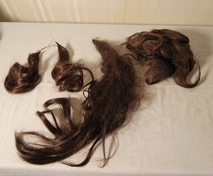 lot 132 image: 100% Human Hair Brunette Ponytail and Chignon Bun Extensions