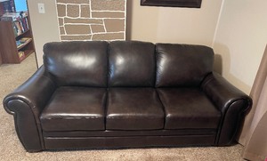 lot 3 image: Faux Leather CouchSofa