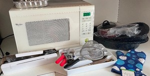 lot 17 image: Large Kitchen Lot with Whirlpool Microwave and 62 pc Flatware