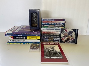 lot 77 image: Wrestling Books, Trading Cards and DVDs