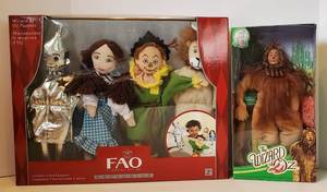 lot 88 image: FAO Schwarz Wizard of Oz Puppets 2014  and The Cowardly Lion Collector Barbie 2013
