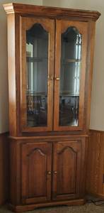 lot 150 image: Lighted Two Piece Corner Hutch with mirrored back