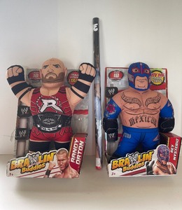 lot 86 image: Two Stuffed Brawling Buddies and WWE Poster 2013
