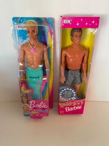 lot 82 image: Barbie Dreamtopia 2018 and Sparkle Beach Ken Dolls 1995