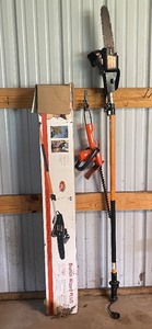 lot 93 image: Remington 2 in 1 Telescoping Pole Saw  Black & Decker 16 Electric Hedge Trimmer