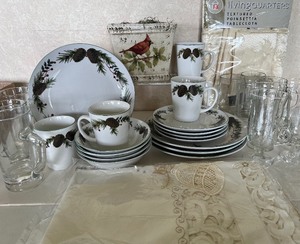lot 26 image: Four Piece Christmas Dinnerware Set Pinecones by Totally Today and Hot ToddyIrish Whiskey Glasses