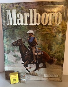 lot 7 image: Marlboro Tin Litho and Cigarette Memorabilia